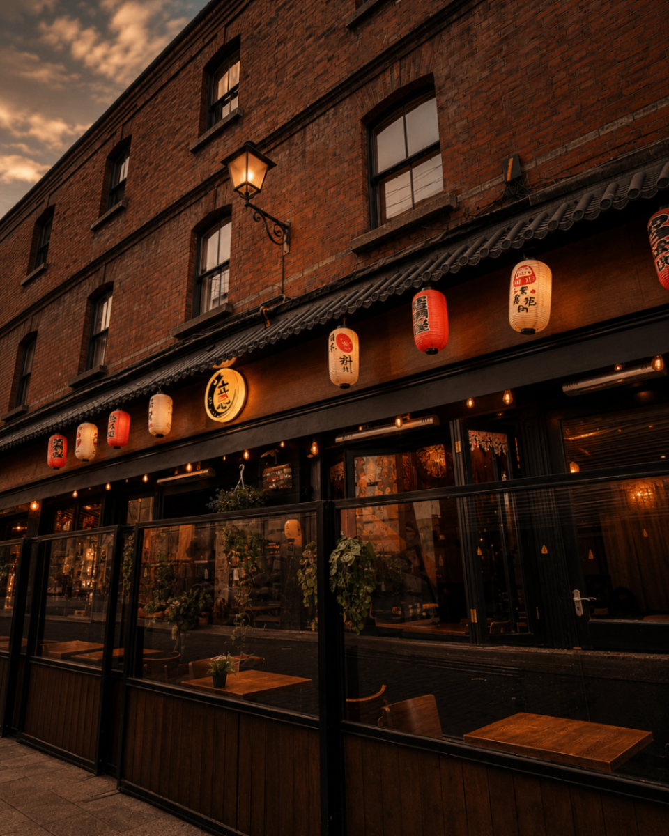 Izushi Izakaya facade at dusk with red lanterns